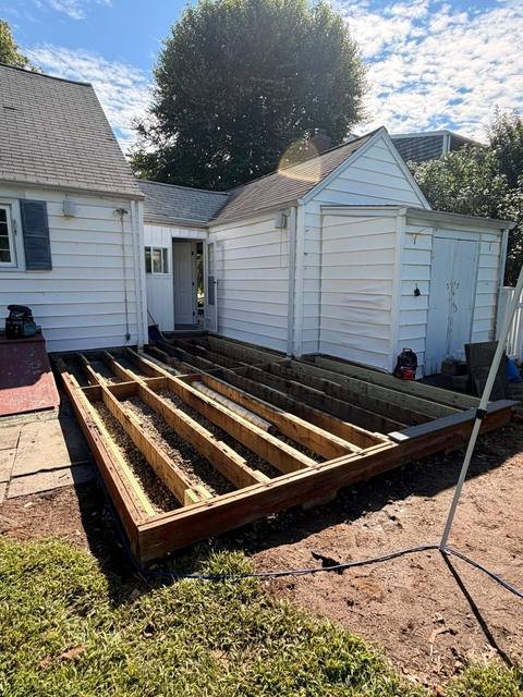 Deck framing and joists under construction