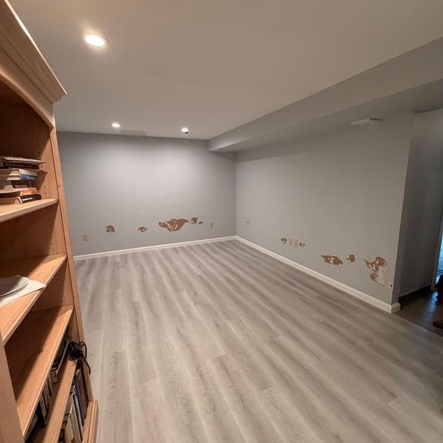 Laminate flooring installed in a finished basement